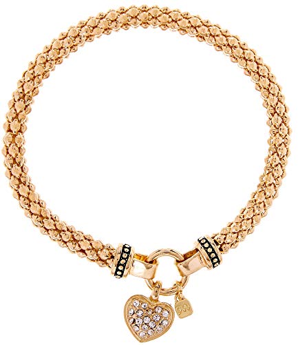 ELEGANCIA QUE BRILLA: Descubre cómo la PULSERA NINE WEST PAVE HEART STRETCH puede transformar tu estilo con su diseño en cristal y ajuste perfecto para cualquier ocasión.