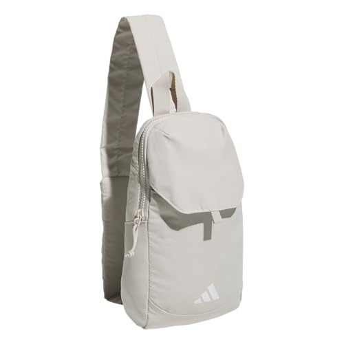 DESCUBRE LA COMODIDAD IDEAL PARA TUS AVENTURAS: la bolsa ADIDAS ESSENTIALS 3 SLING CROSSBODY (5L) en tono GRIS ALÚMINA combina estilo y funcionalidad en un diseño ligero y versátil - ¡El accesorio perfecto para tu día a día!