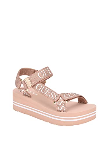 ¡Renueva tu estilo con elegancia! Las GUESS SANDALIAS AVIN de cuña en ORO ROSA son la combinación perfecta de comodidad y moda, ideal para destacar en cualquier ocasión.