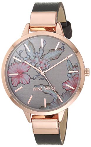 Descubre cómo elevar tu estilo diario con elegancia atemporal: el reloj NINE WEST NW/2044FLGY combina un diseño floral sofisticado y acabados en oro rosa para ofrecer precisión y distinción en cada ocasión.
